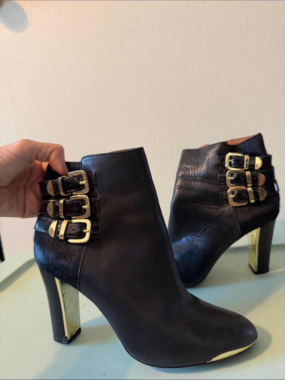 Louise et Cie Black Leather Ankle Boots with Gold Buckle Accents